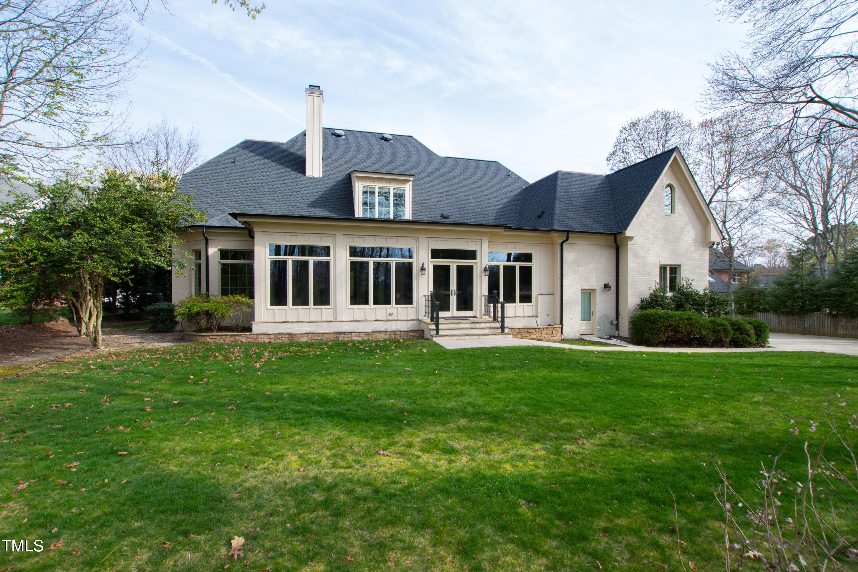 8108 Harps Mill Road Raleigh, NC 27615 - Photo 64 of 64 a house view with a garden space