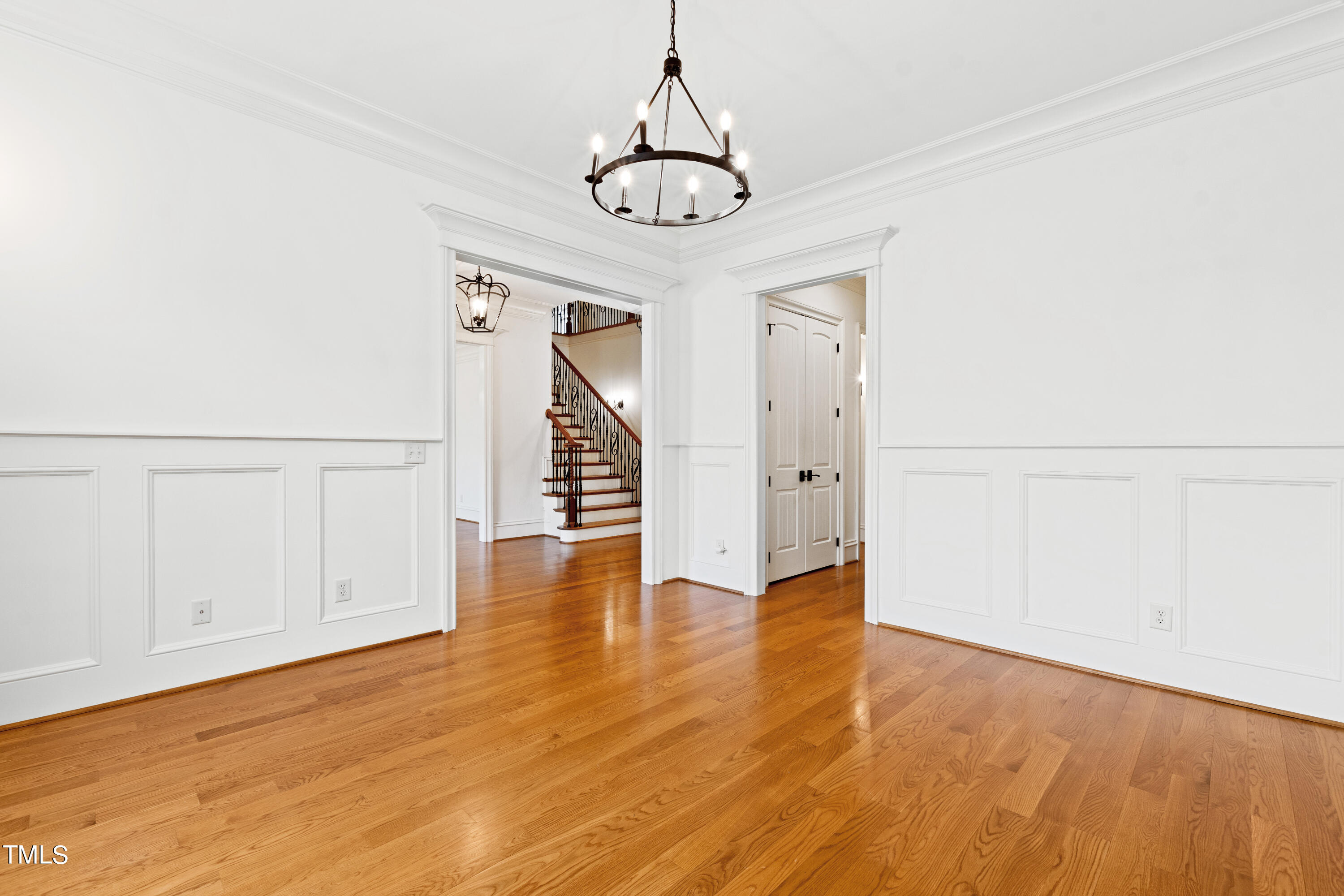 8108 Harps Mill Road Raleigh, NC 27615 - Photo 10 of 64 a view of an entryway with wooden floor