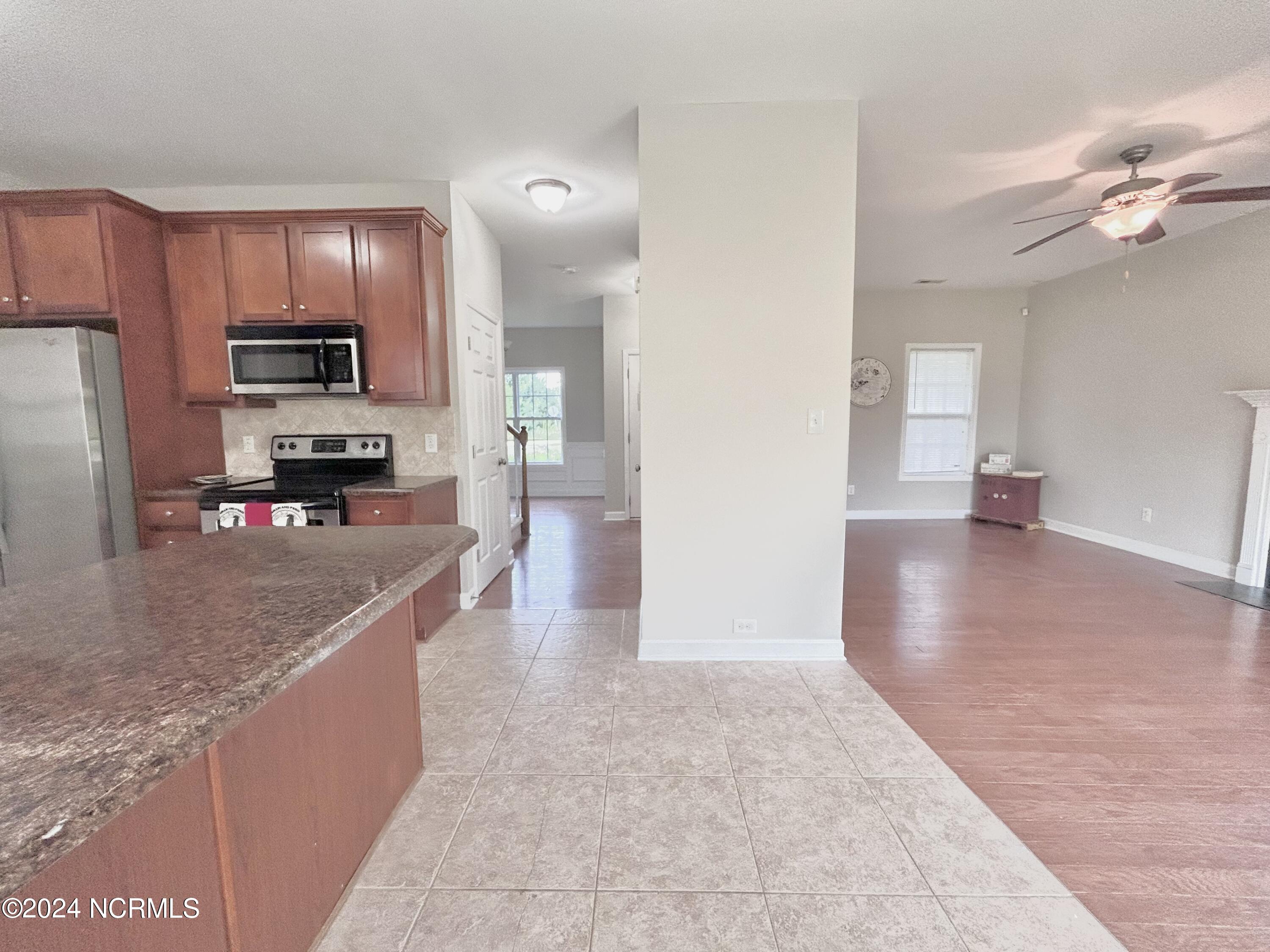 341 Old Dam Road Jacksonville, NC 28540 - Photo 13 of 45 Living Room to Dining