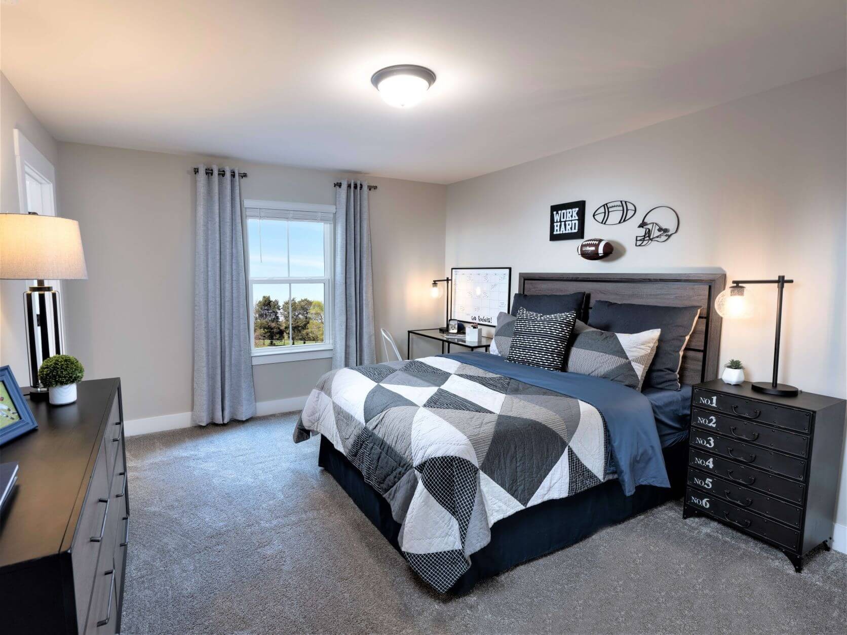 692 Castle Road Mount Juliet, TN 37122 - Photo 13 of 19 a bedroom with a bed and a lamp on dresser