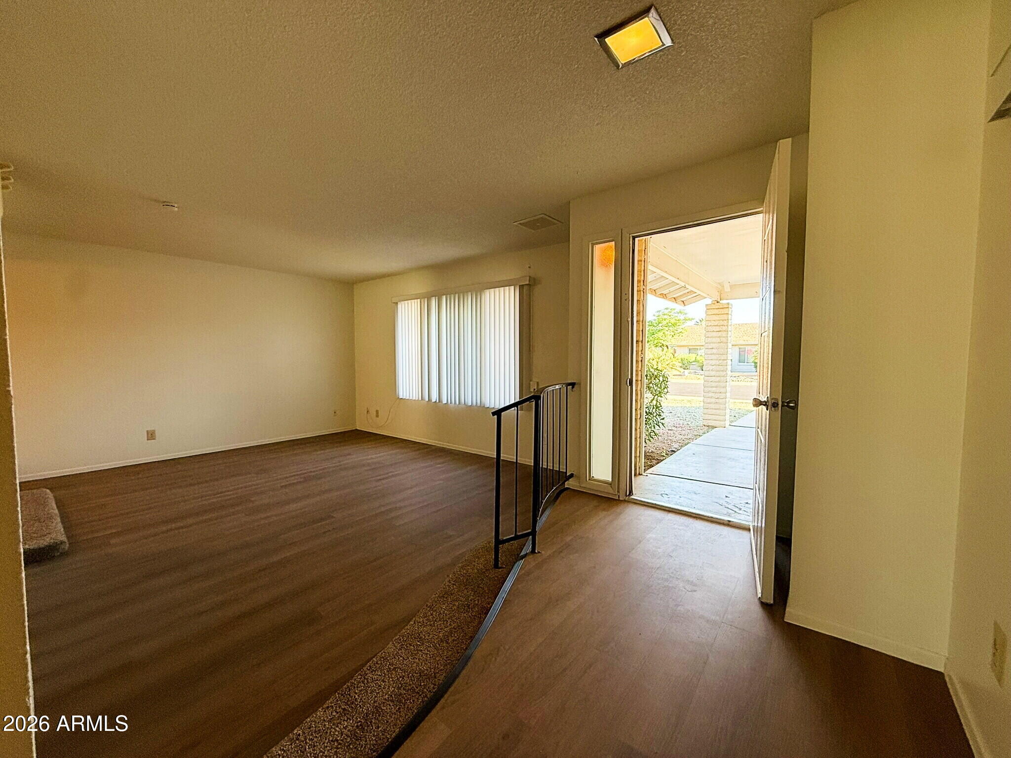 5208 West Calavar Road Glendale, AZ 85306 - Photo 4 of 39 a view of an empty room and window