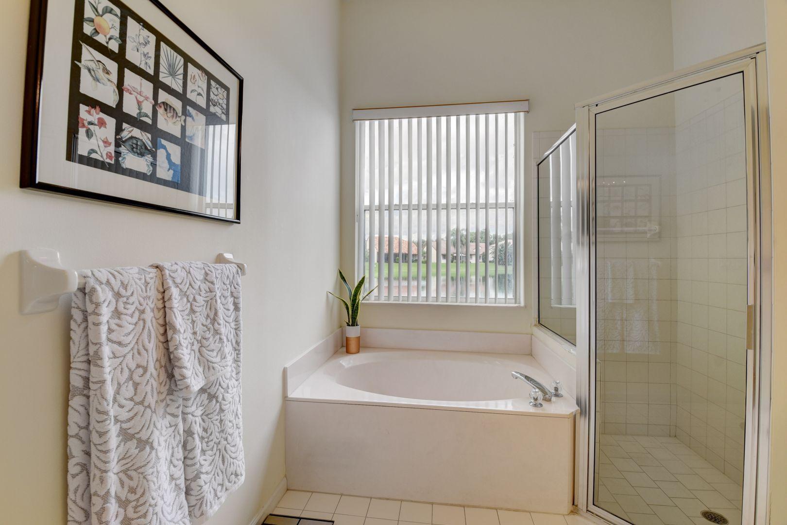 23349 Water Circle Boca Raton, FL 33486 - Photo 20 of 44 Master Bathroom with tub and shower