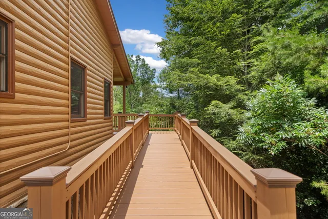 a view of balcony and yard