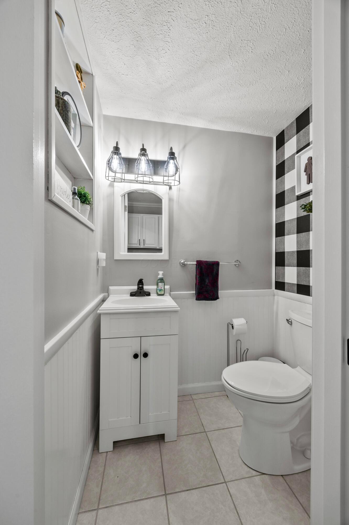 6750 Merwin Place Columbus, OH 43235 - Photo 16 of 46 Half bath on main level