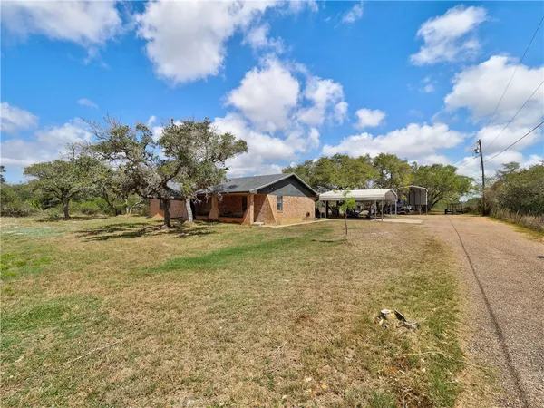 a front view of house with yard