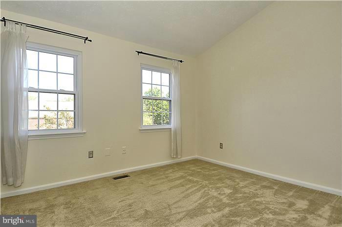 515 Pickwick Village Way Silver Spring, MD 20901 - Photo 15 of 20 an empty room with a window