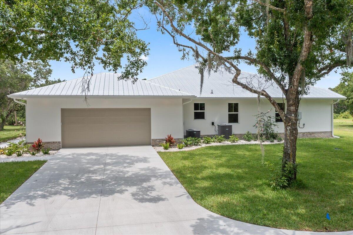 3570 Hield Road Melbourne, FL 32904 - Photo 64 of 83 Side Elevation