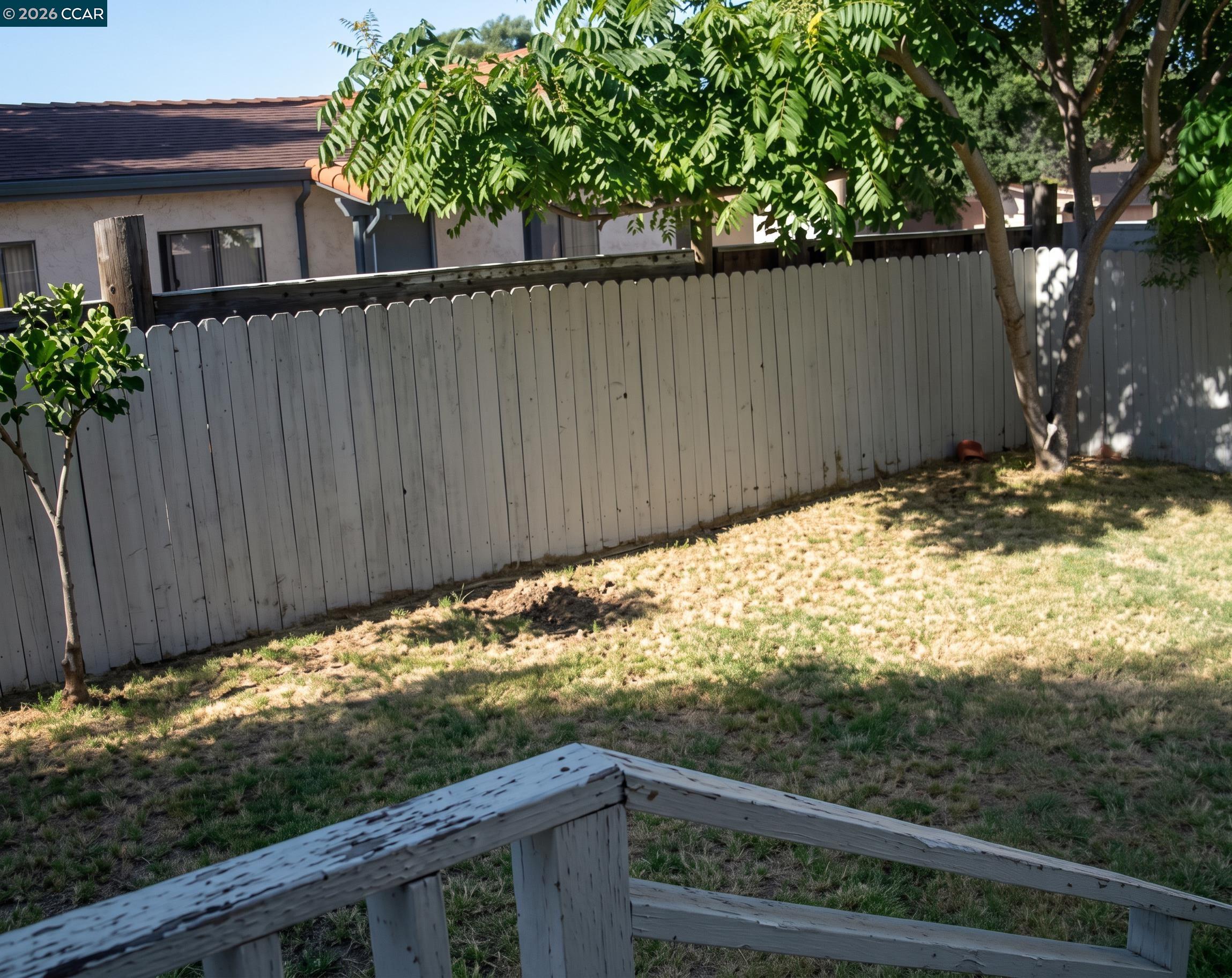 70 West Rose Bay Point, CA 94565 - Photo 8 of 8 a view of a wooden fence