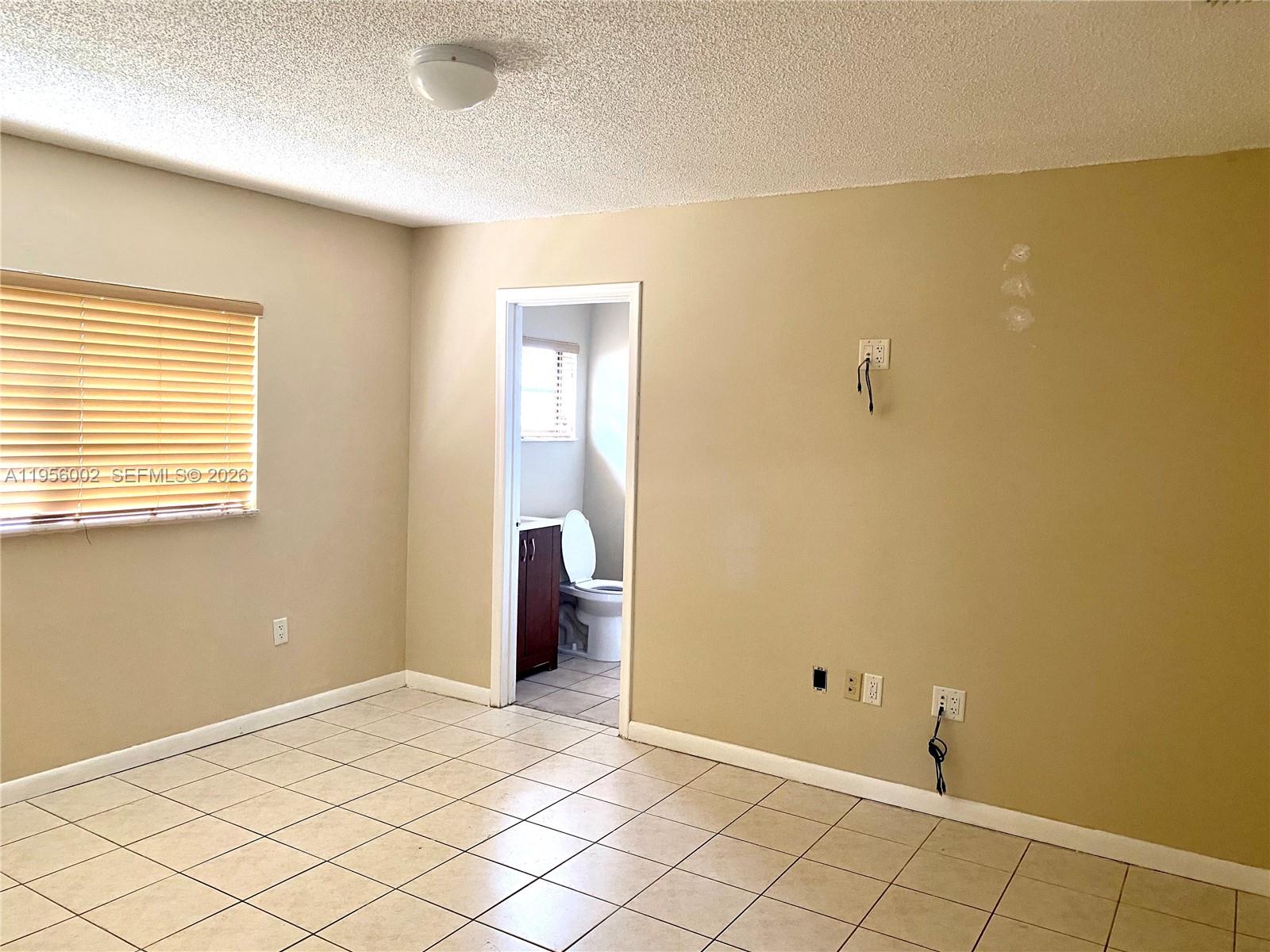 13987 Southwest 50th Terrace Miami, FL 33175 - Photo 10 of 13 Master Bedroom