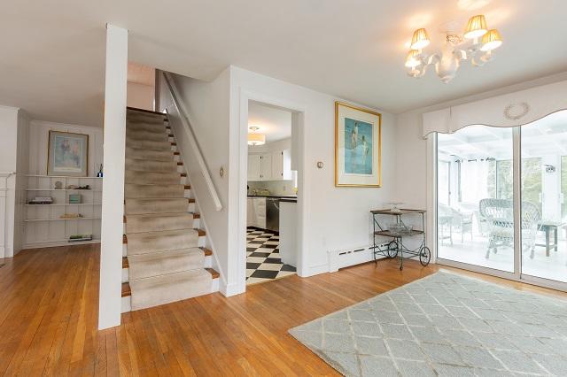 56 Nickerson Road Cotuit, MA 02635 - Photo 11 of 36 a view of a bedroom with wooden floor and windows