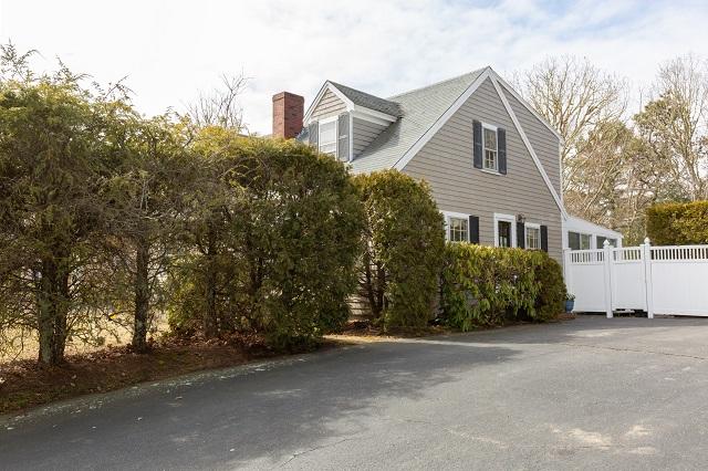 56 Nickerson Road Cotuit, MA 02635 - Photo 2 of 36 a view of a house with a street