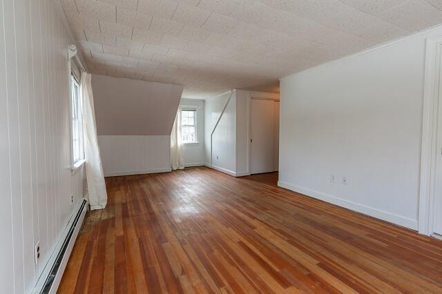56 Nickerson Road Cotuit, MA 02635 - Photo 24 of 36 a view of a room with wooden floor and stairs
