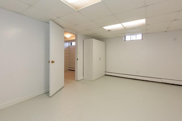 56 Nickerson Road Cotuit, MA 02635 - Photo 27 of 36 an empty room with a windows and closet
