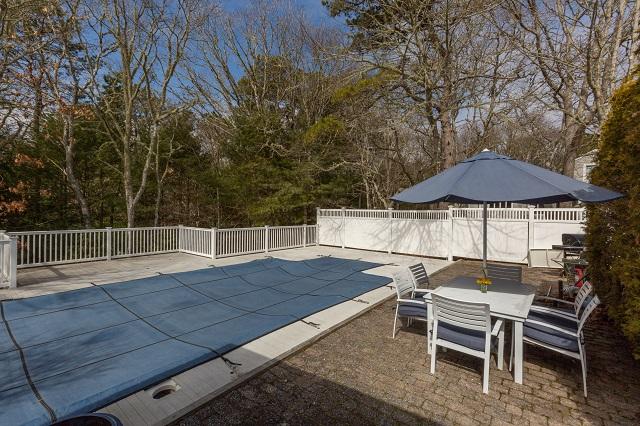56 Nickerson Road Cotuit, MA 02635 - Photo 30 of 36 a view of a chairs and table on the wooden floor
