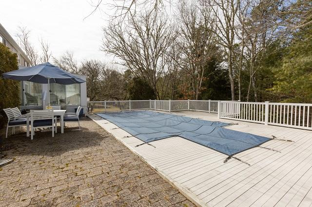 56 Nickerson Road Cotuit, MA 02635 - Photo 32 of 36 a view of a terrace with chairs