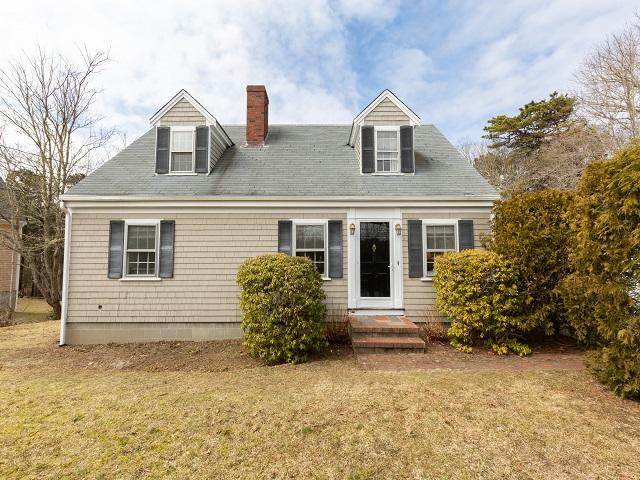 56 Nickerson Road Cotuit, MA 02635 - Photo 33 of 36 front view of house with a yard