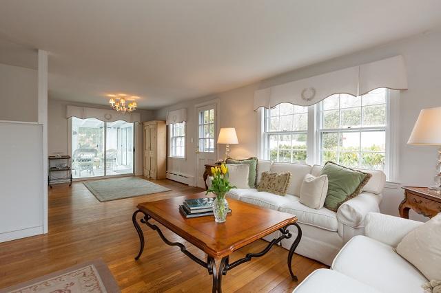 56 Nickerson Road Cotuit, MA 02635 - Photo 5 of 36 a living room with furniture large window and wooden floor