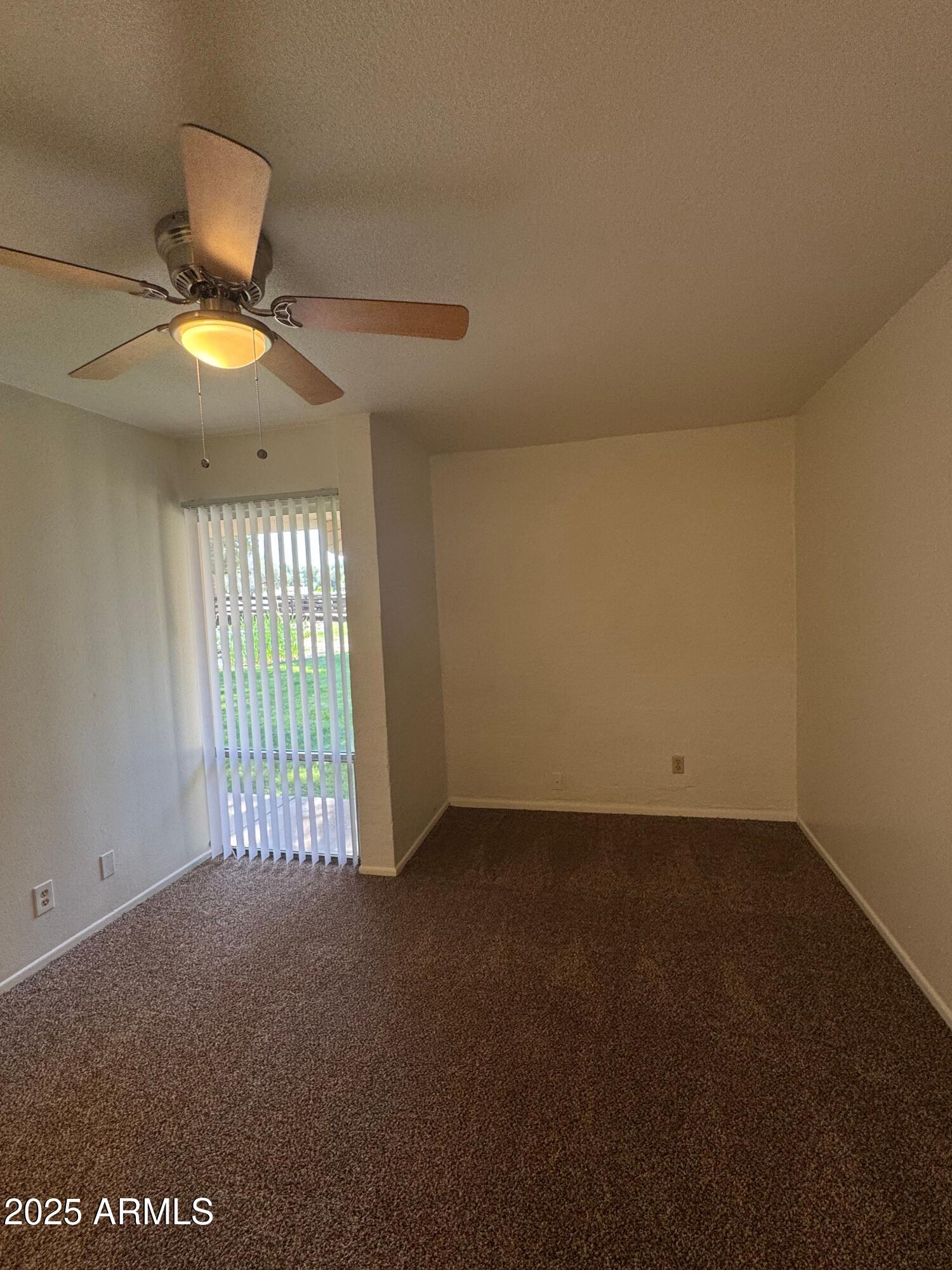 930 South Dobson Road, Unit 23 Mesa, AZ 85202 - Photo 7 of 13 a view of an empty room