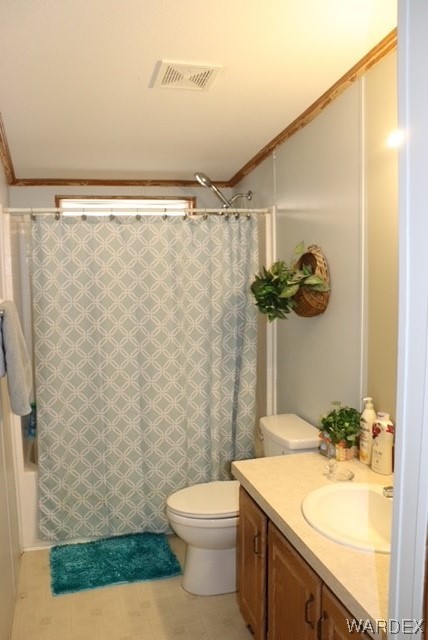 4245 Cibola Road Golden Valley, AZ 86413 - Photo 19 of 21 a bathroom with a granite countertop sink toilet and shower