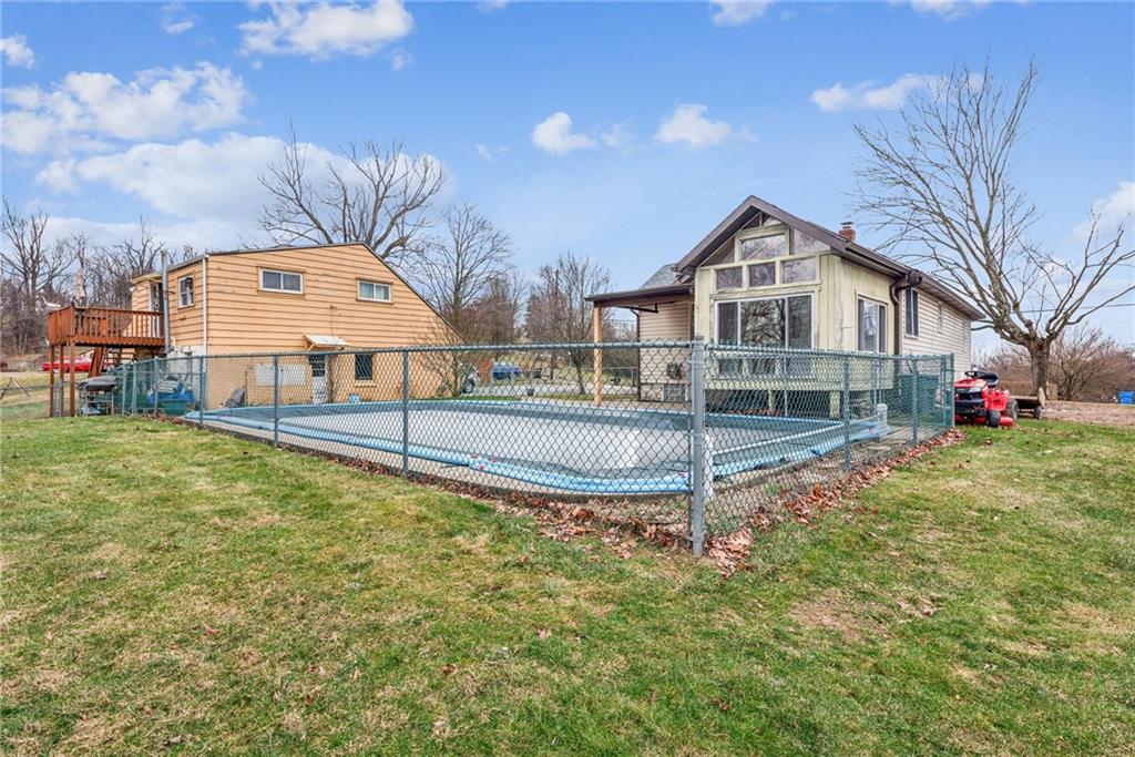 221 Woodside Road Irwin, PA 15642 - Photo 18 of 35 a front view of house with yard