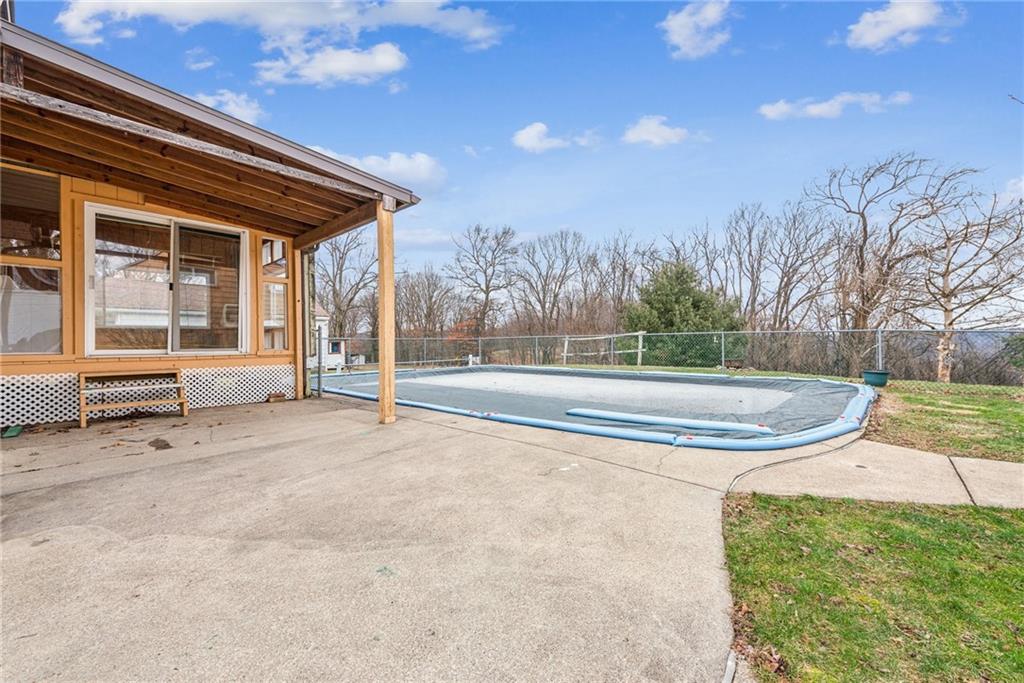 221 Woodside Road Irwin, PA 15642 - Photo 21 of 35 a view of a house with basketball court