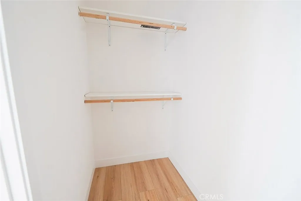 3642 6th Avenue Jefferson Park, CA 90018 - Photo 22 of 26 a view of small space with racks on the wall