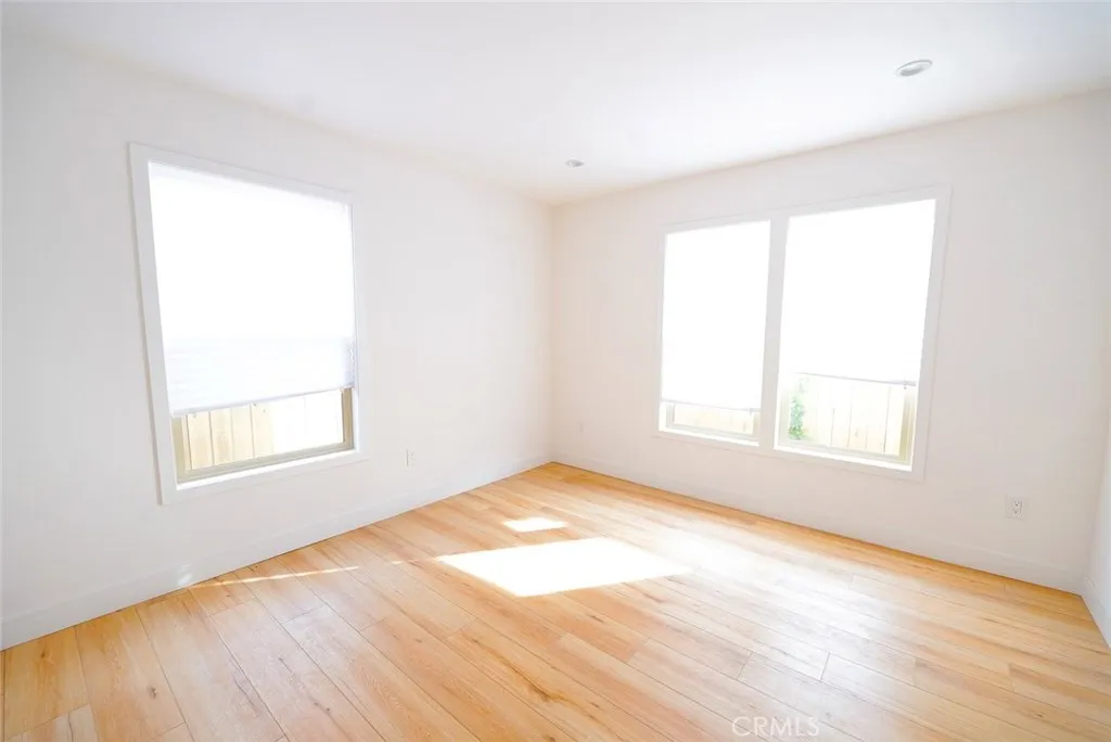 3642 6th Avenue Jefferson Park, CA 90018 - Photo 24 of 26 an empty room with a window