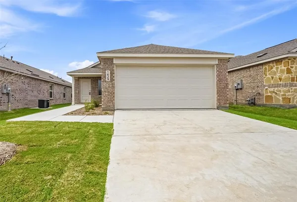 a front view of house with yard