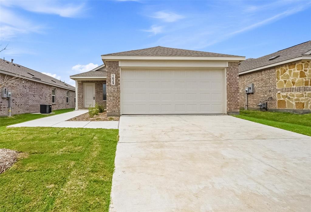 a front view of house with yard