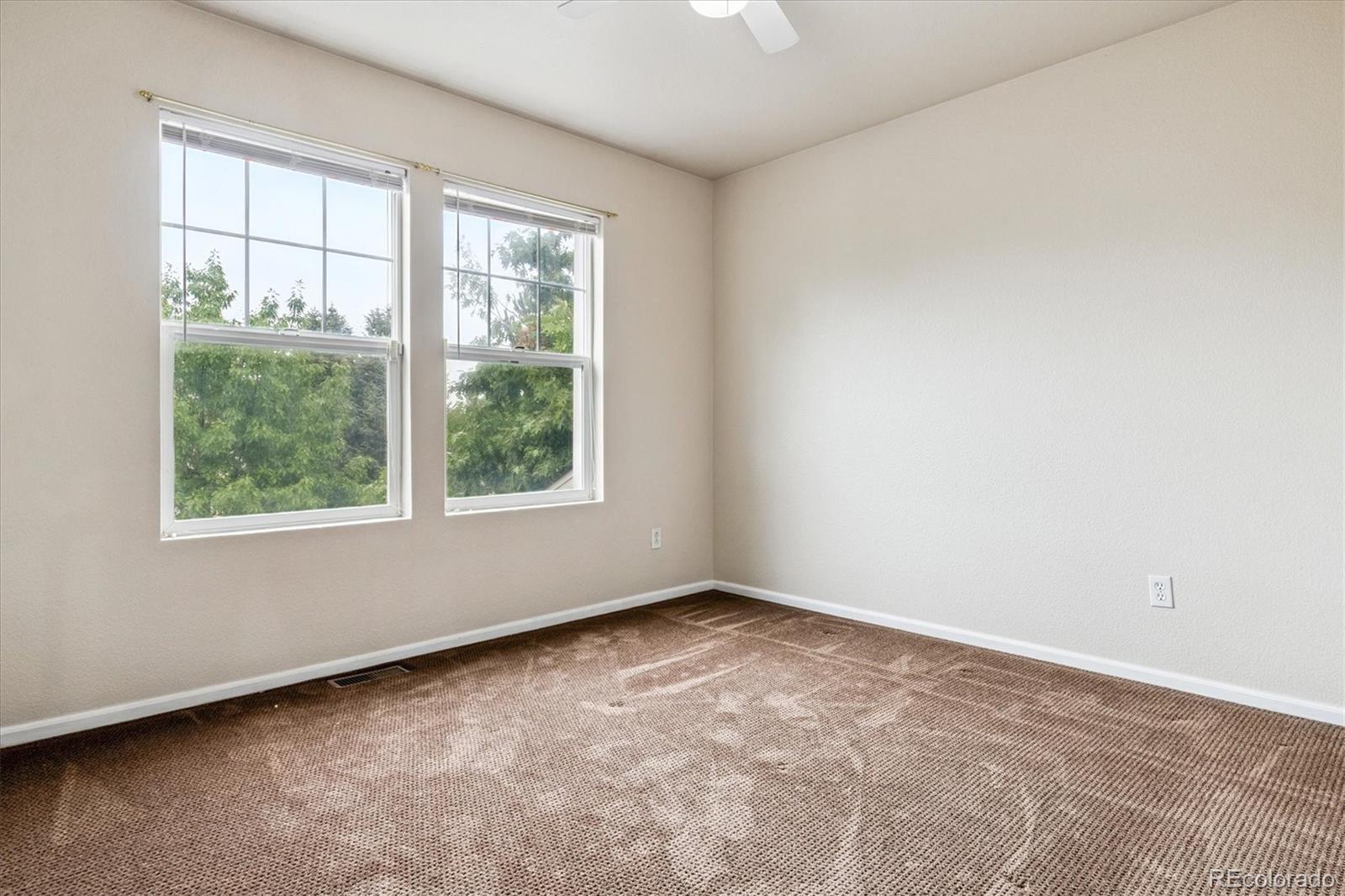 4658 Flower Street Wheat Ridge, CO 80033 - Photo 16 of 26 an empty room with a window