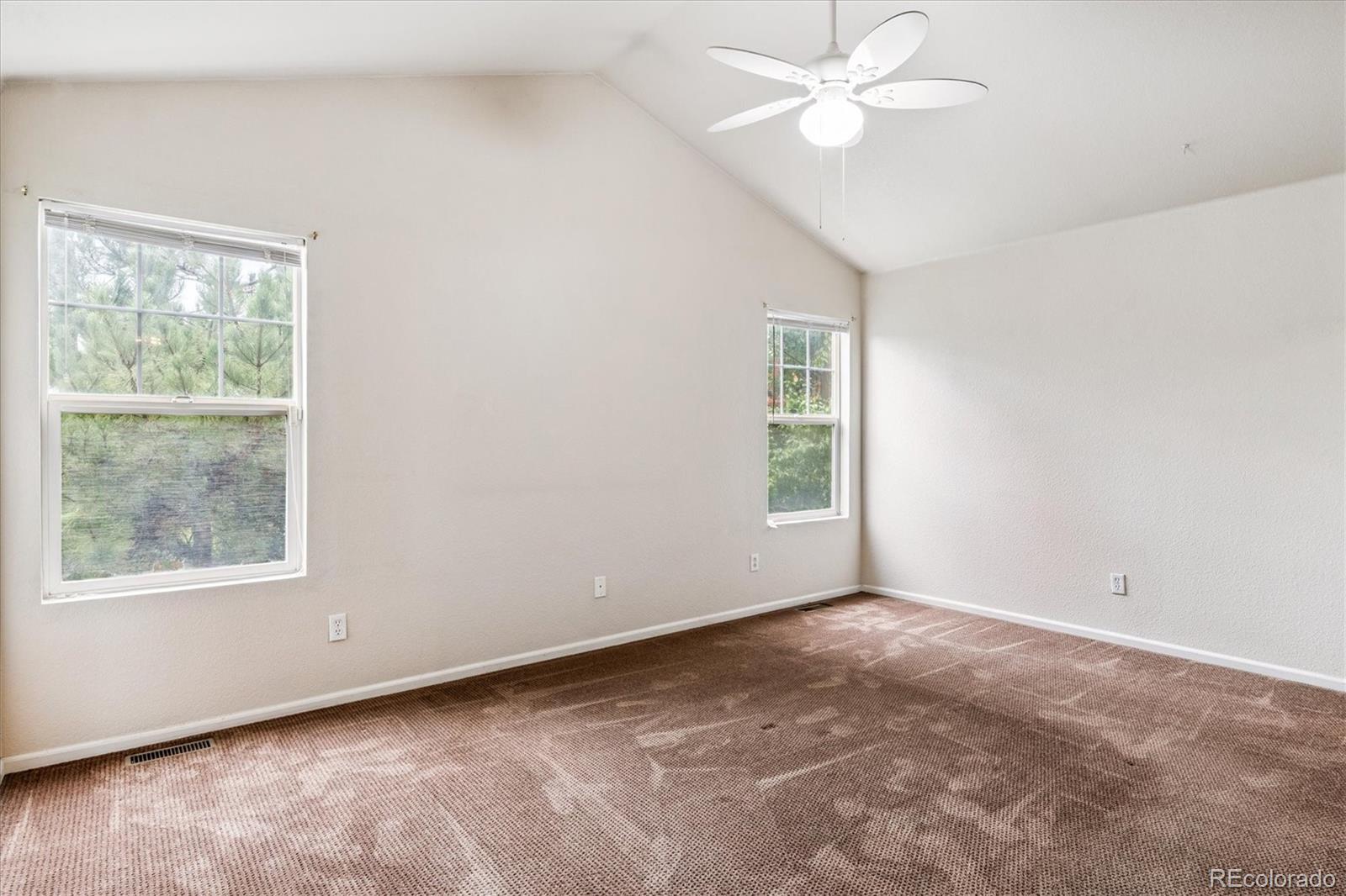 4658 Flower Street Wheat Ridge, CO 80033 - Photo 18 of 26 a view of an empty room with a window