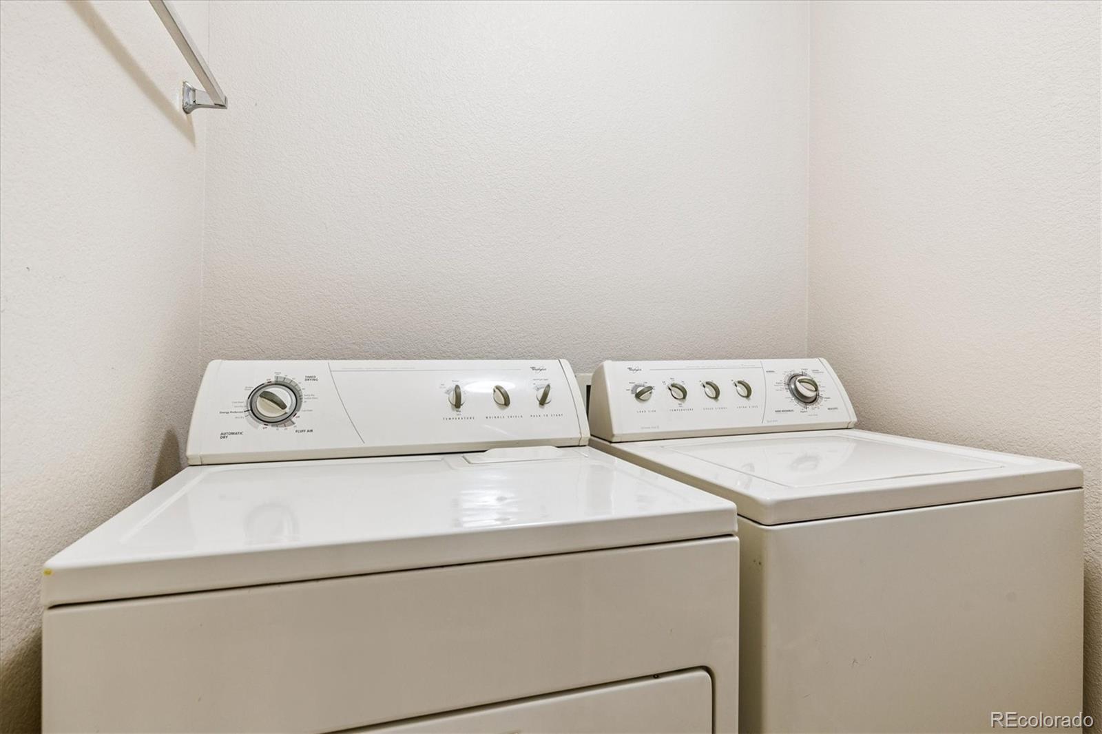 4658 Flower Street Wheat Ridge, CO 80033 - Photo 21 of 26 a utility room with dryer and washer