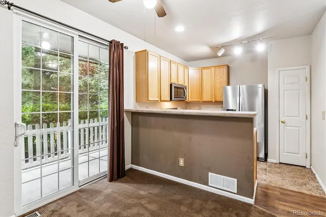a view of a kitchen with a sink