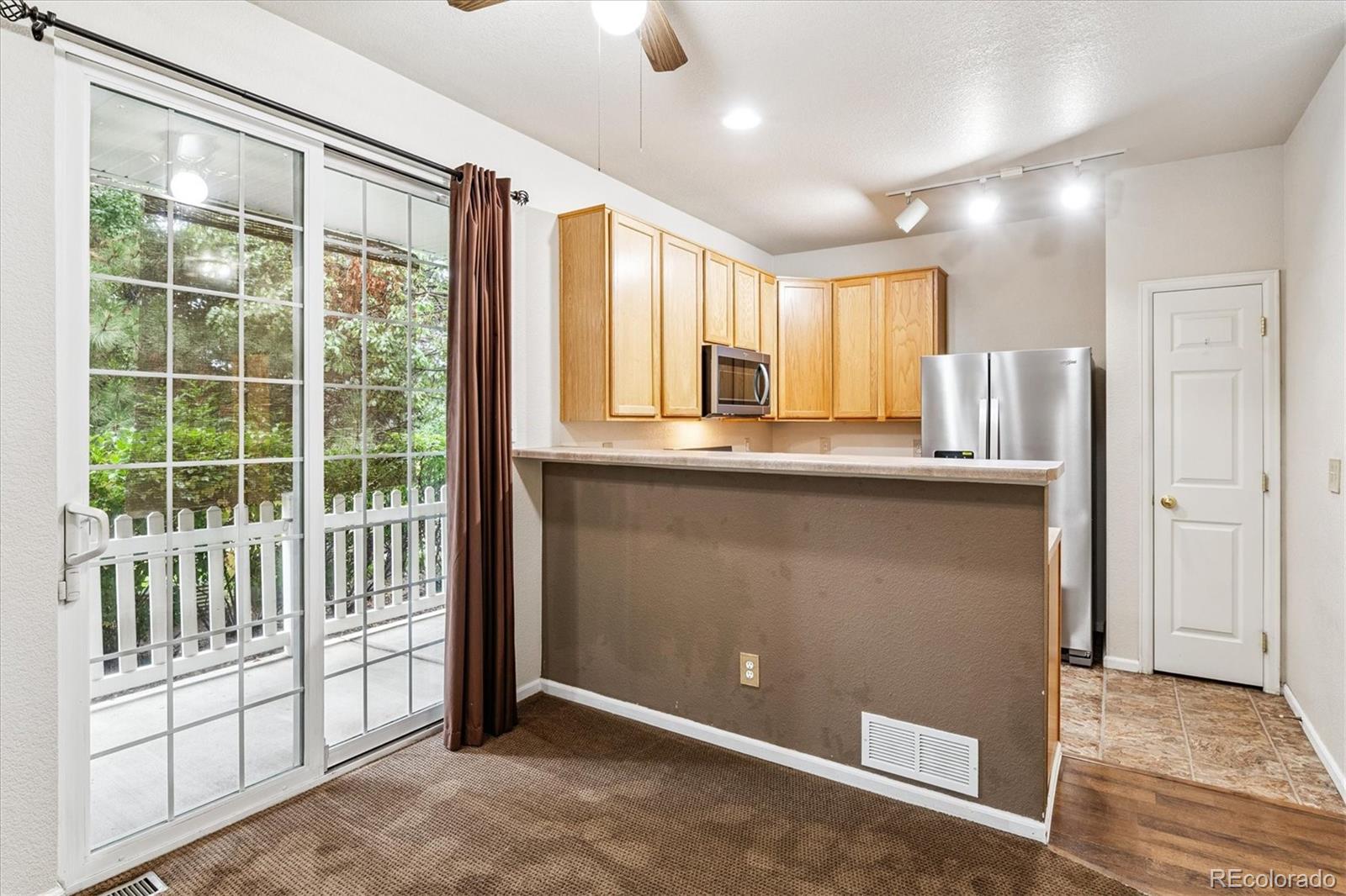 4658 Flower Street Wheat Ridge, CO 80033 - Photo 4 of 26 a view of a kitchen with a sink