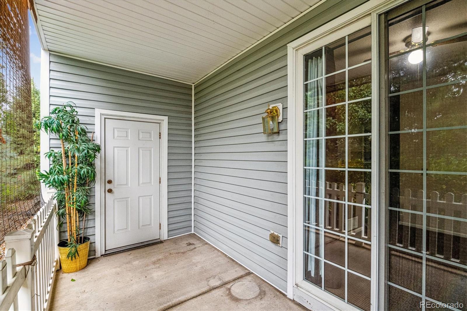4658 Flower Street Wheat Ridge, CO 80033 - Photo 10 of 26 a view of front door