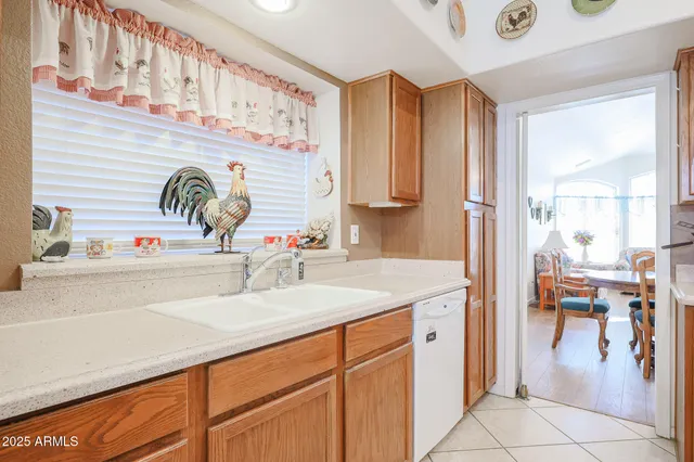 a en suite bathroom with a sink a mirror and a shower