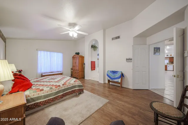 a bedroom with a bed and furniture