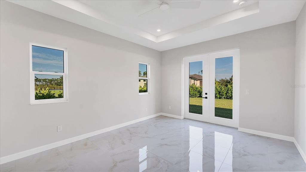 242 Brig Circle West Placida, FL 33946 - Photo 13 of 30 an empty room with windows