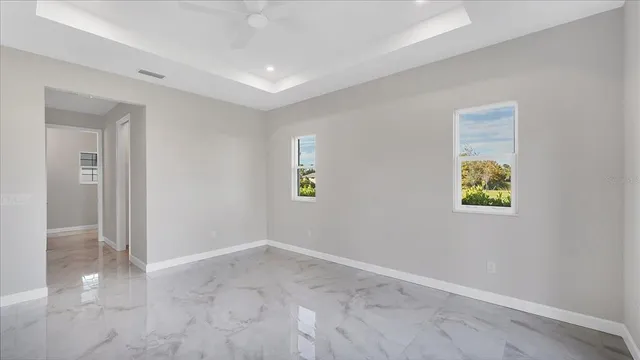 an empty room with windows