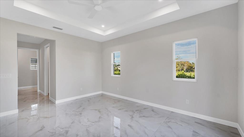 242 Brig Circle West Placida, FL 33946 - Photo 14 of 30 an empty room with windows