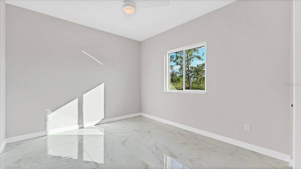 242 Brig Circle West Placida, FL 33946 - Photo 20 of 30 an empty room with windows