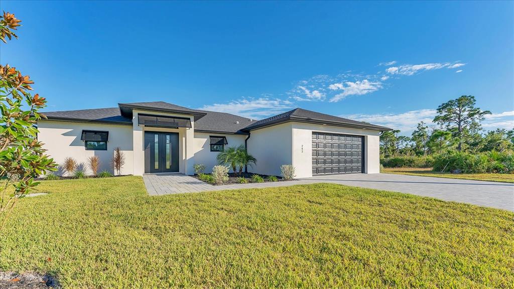 242 Brig Circle West Placida, FL 33946 - Photo 2 of 30 a view of a house with a patio