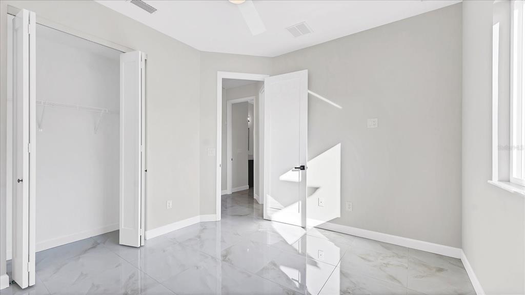 242 Brig Circle West Placida, FL 33946 - Photo 25 of 30 an empty room with a natural light