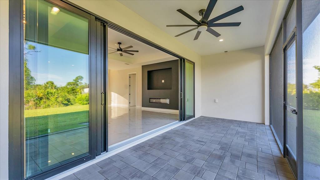 242 Brig Circle West Placida, FL 33946 - Photo 28 of 30 a view of room with window and a ceiling fan