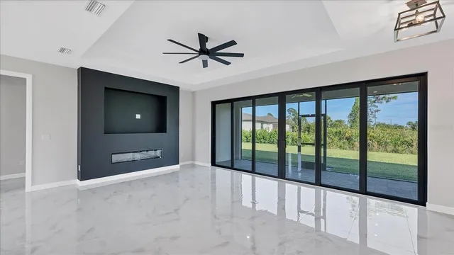 a view of an empty room and window