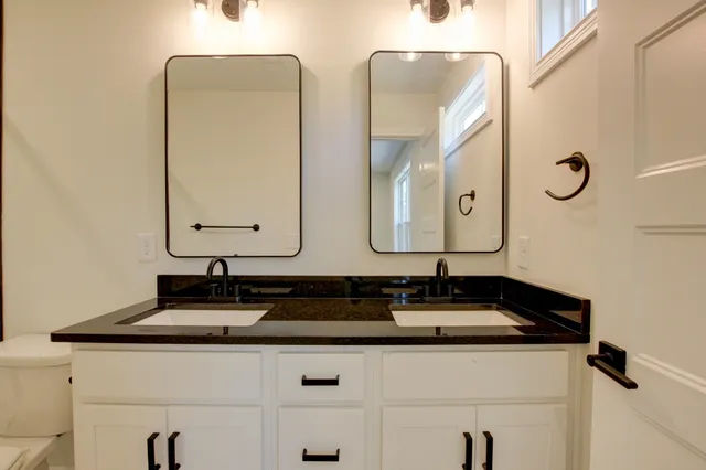a close view of sink and mirror