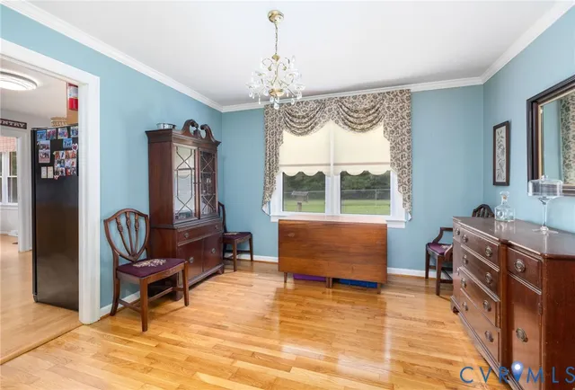 a living room with furniture bathtub and a window