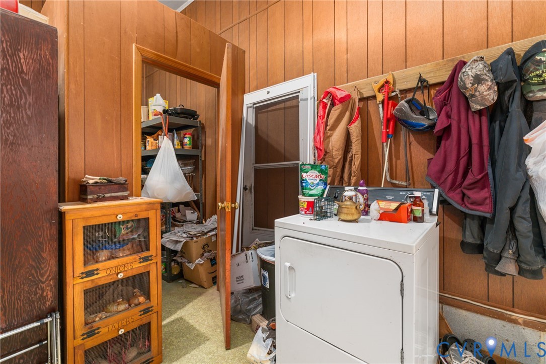 2570 Sandy Lane Victoria, VA 23974 - Photo 28 of 37 Washroom with wooden walls and washer / dryer