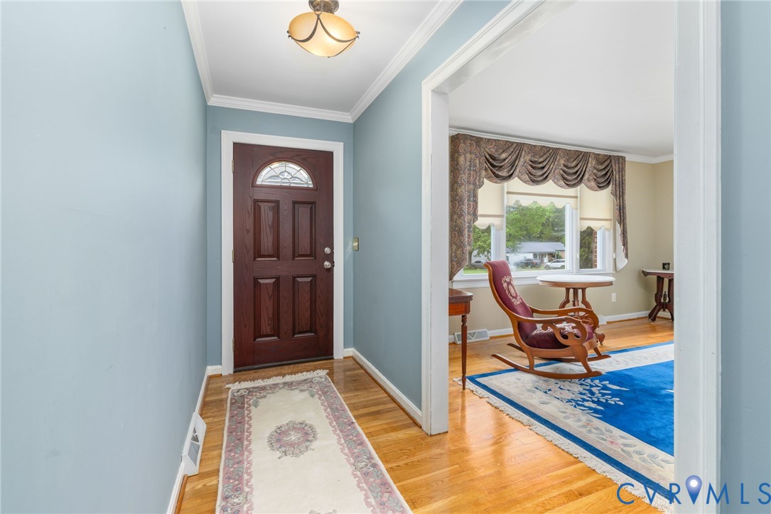 2570 Sandy Lane Victoria, VA 23974 - Photo 7 of 37 Foyer entrance with crown molding, healthy amount
