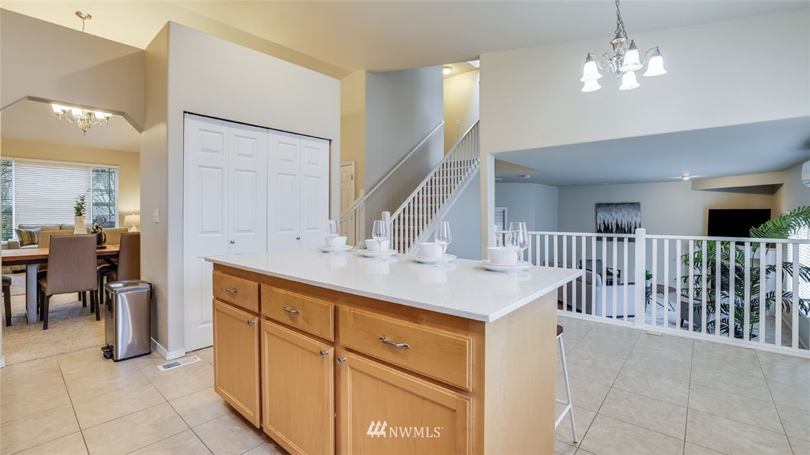 6725 Southeast 3rd Street Renton, WA 98059 - Photo 13 of 32 a kitchen with a sink and cabinets
